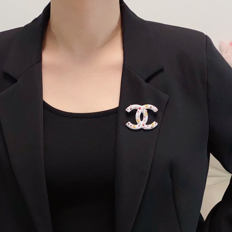Ch**el brooches